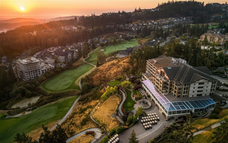 Bear Mountain Resort at sunrise: hillside lodge above the golf course, Langford