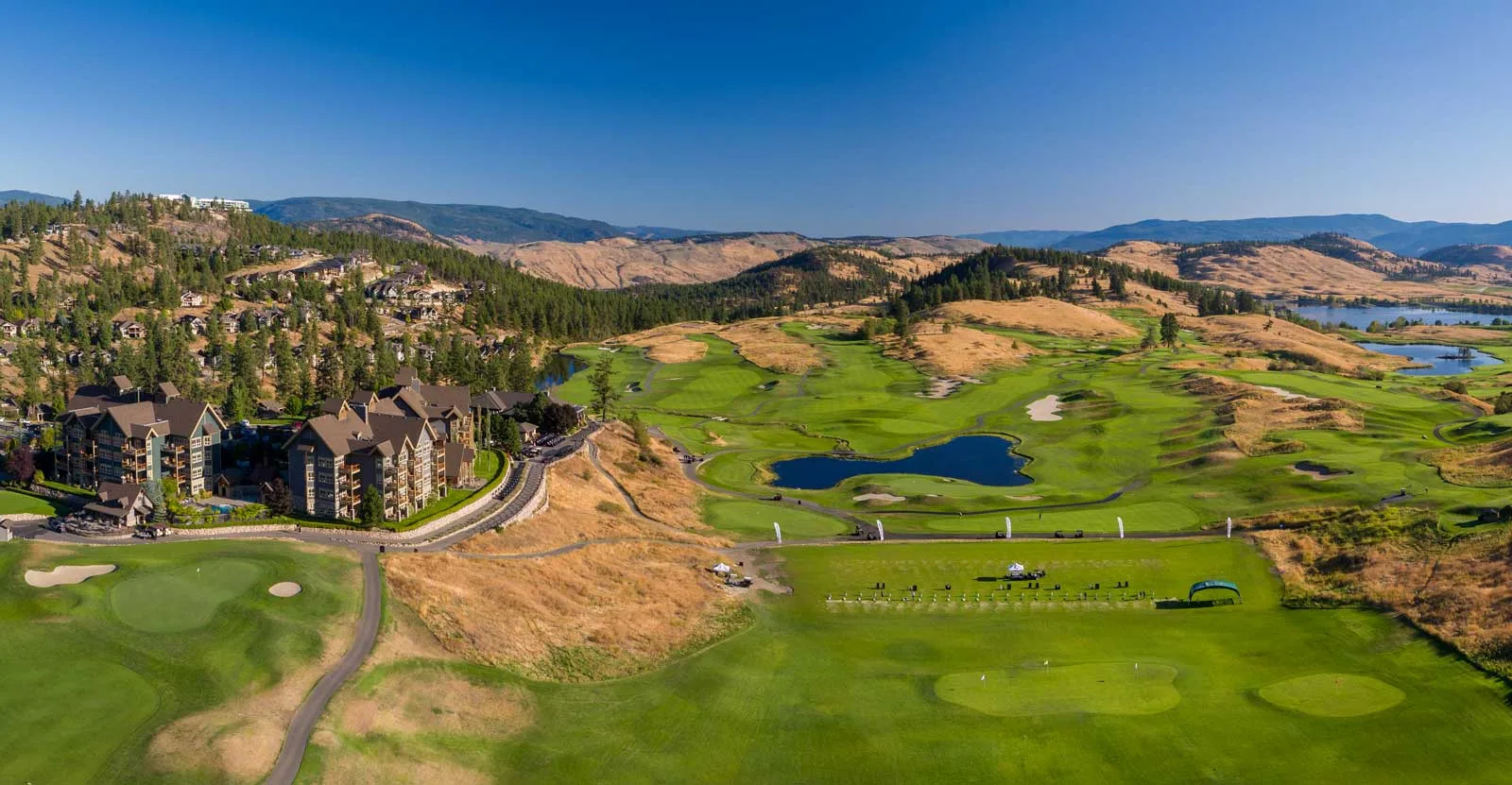 Predator Ridge Resort: aerial over the golf course and hillside neighbourhoods